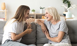 Ladies converse on couch