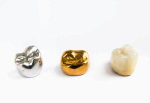 Three different types of crowns on a white background